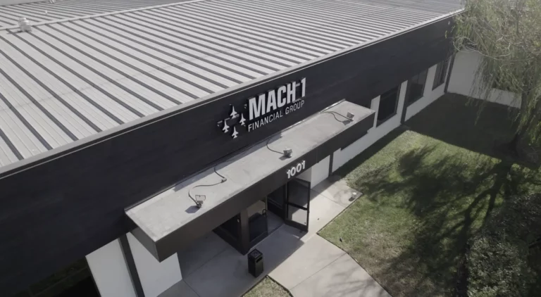 High-angled photo of front of Mach 1 Financial office located in Rogers, Arkansas